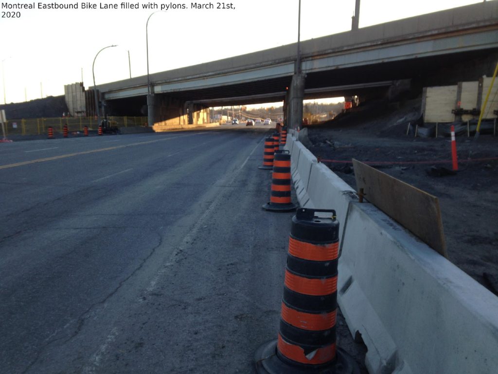Montreal Rd eastbound bike lane filled with pylons, March 21, 2020.
