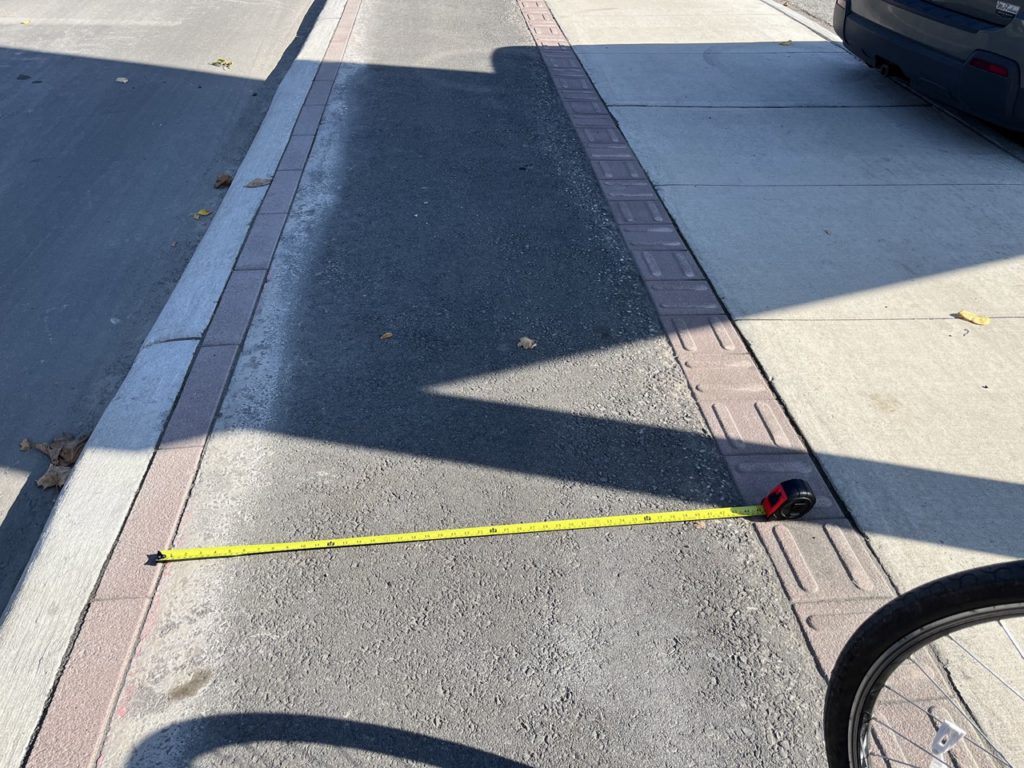 Tape measure across the cycle track that is 1.1m wide.
