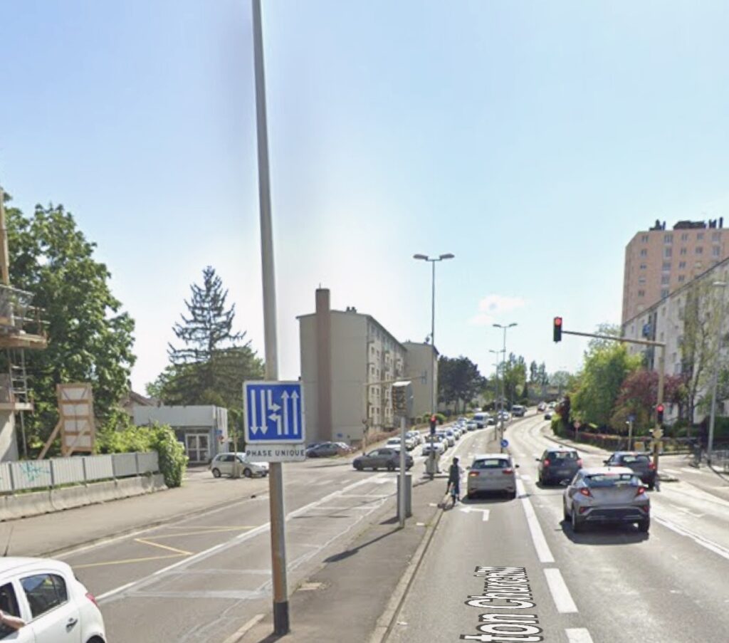 Major artery (4 lanes and two turning lanes) with a speed camera in the middle.